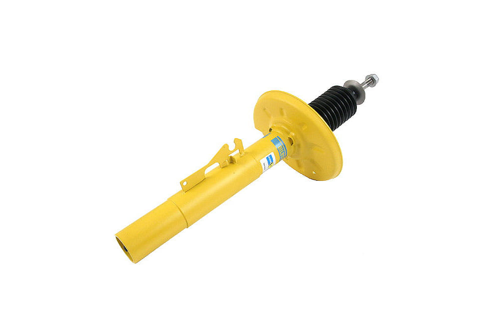 Yellow Bilstein shock absorber for Porsche on white background.