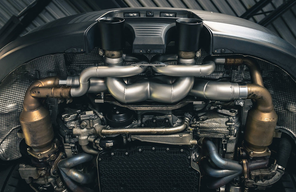 Soul Performance X-Pipe exhaust installed on a Porsche 991.2 with black ehxaust tips.