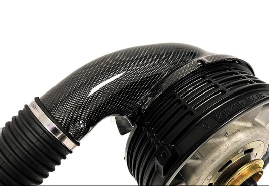 Porsche 964 RS heater duct with carbon fiber pipe on white background.
