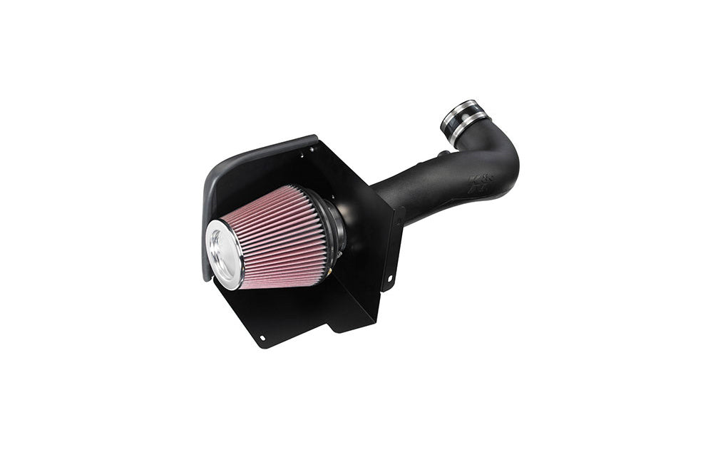 K&N air filter with pink pleated element and heat shield on a white background.