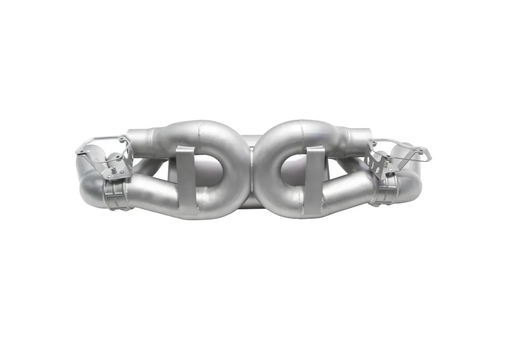 Soul Performance center muffler bypass X-pipe valved exhaust system in silver for Porsche 911 on a white background.