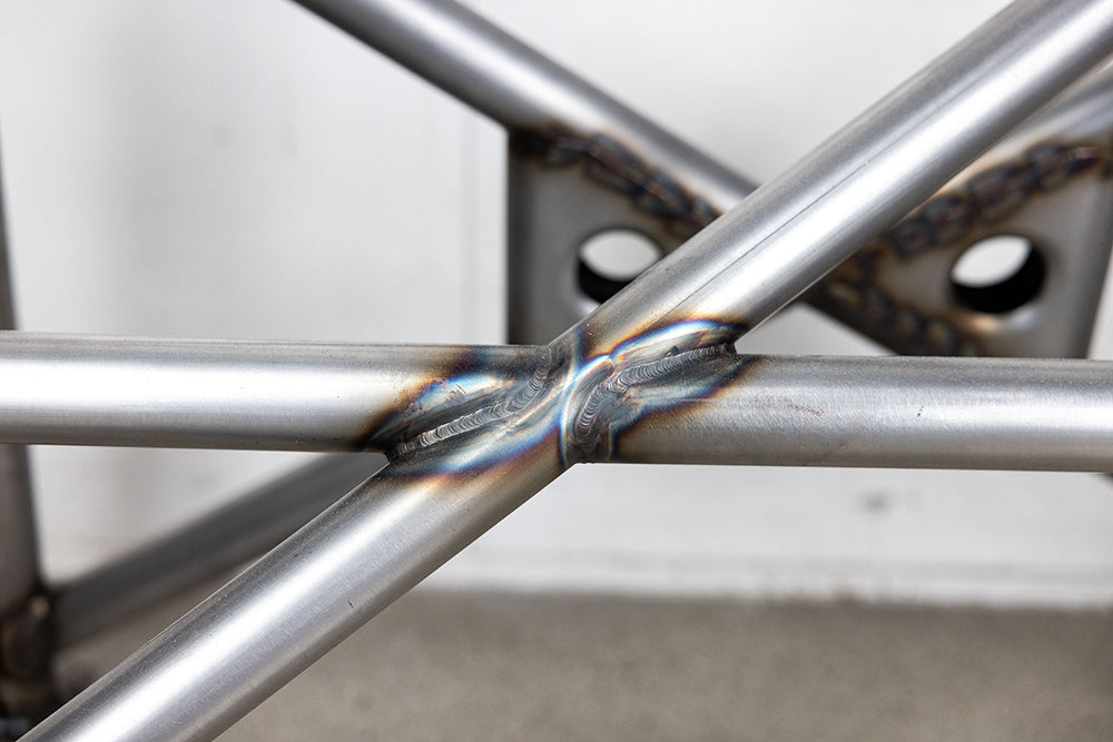Close up of 911 Design roll cage welded joints.