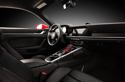 COBB Tuning Accessport installed inside of Porsche 911 992 Carrera black interior.