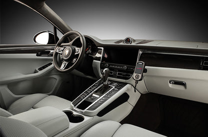 COBB Tuning Accessport installed inside Porsche Macan 95B interior.