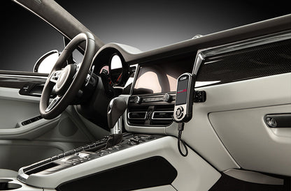 Close up of COBB Tuning Accessport installed inside Porsche Macan 95B interior of right side dash.