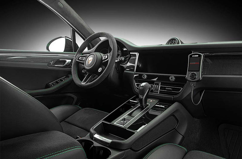 COBB Tuning Accessport installed inside Porsche Macan 95B.3 T interior.