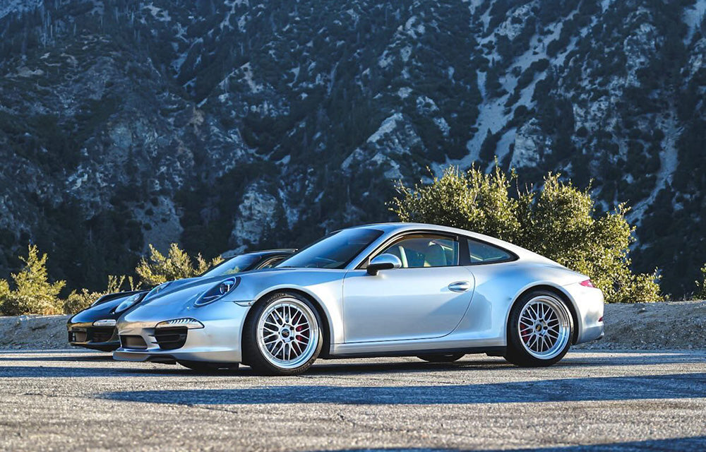 Silver Porsche 991.1 with 20-inch BBS LM in Diamond Silver with canyon background.