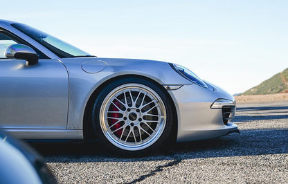 Close up of 20-inch BBS LM in Diamond Silver front wheel on a silver Porsche 991.1 at canyon road.