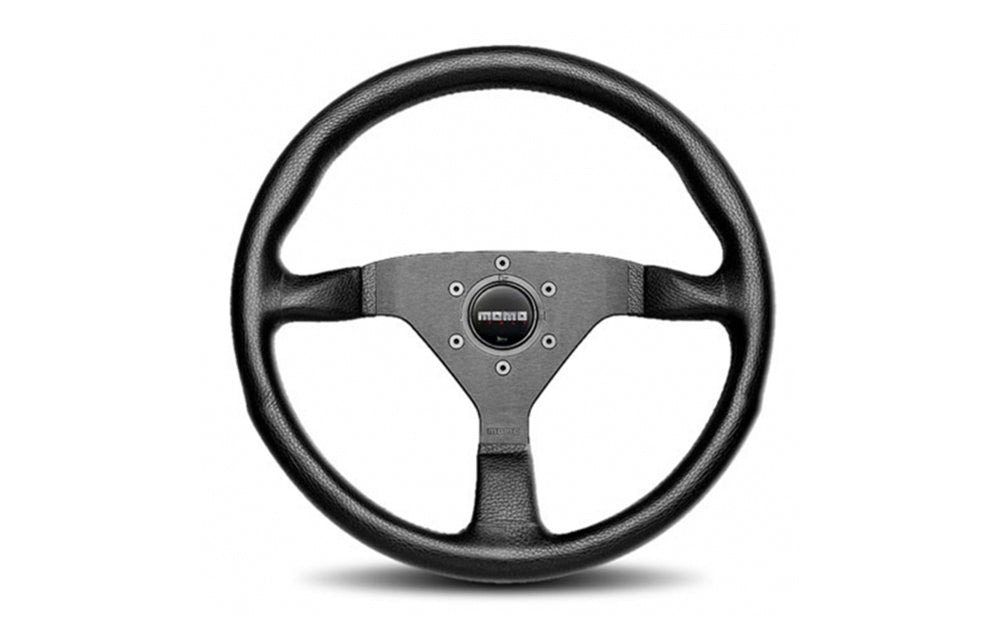 Momo Monte Carlo black steering wheel on a white background.