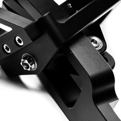Close up of Numeric Short Throw Shifter component in black on a white background.