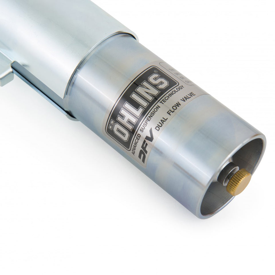 Ohlins dual flow valve at bottom of coilover body on a white background.