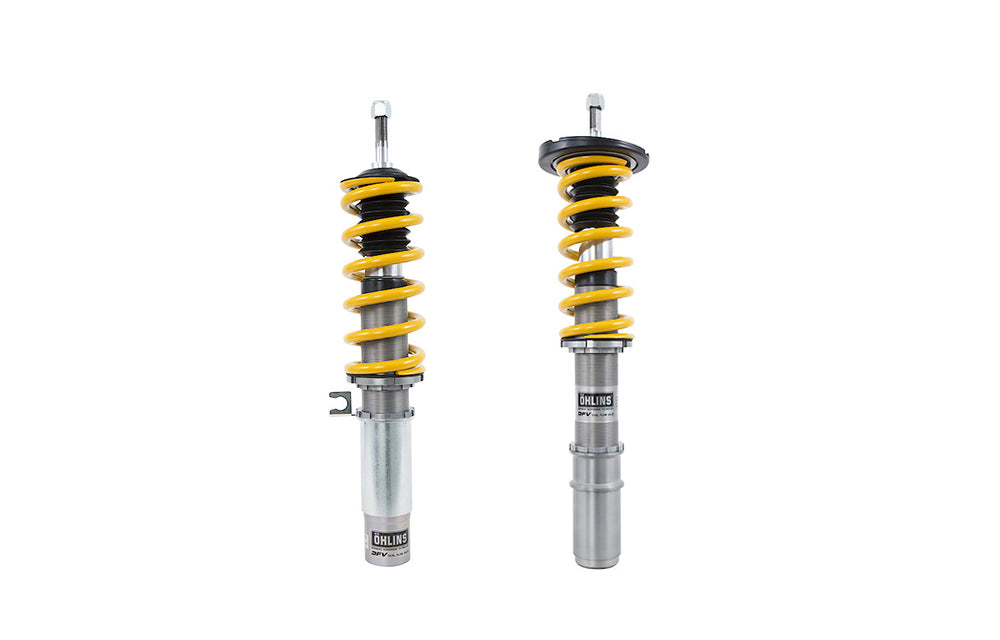 Two Ohlins Road And Track coilovers for Porsche on white background.