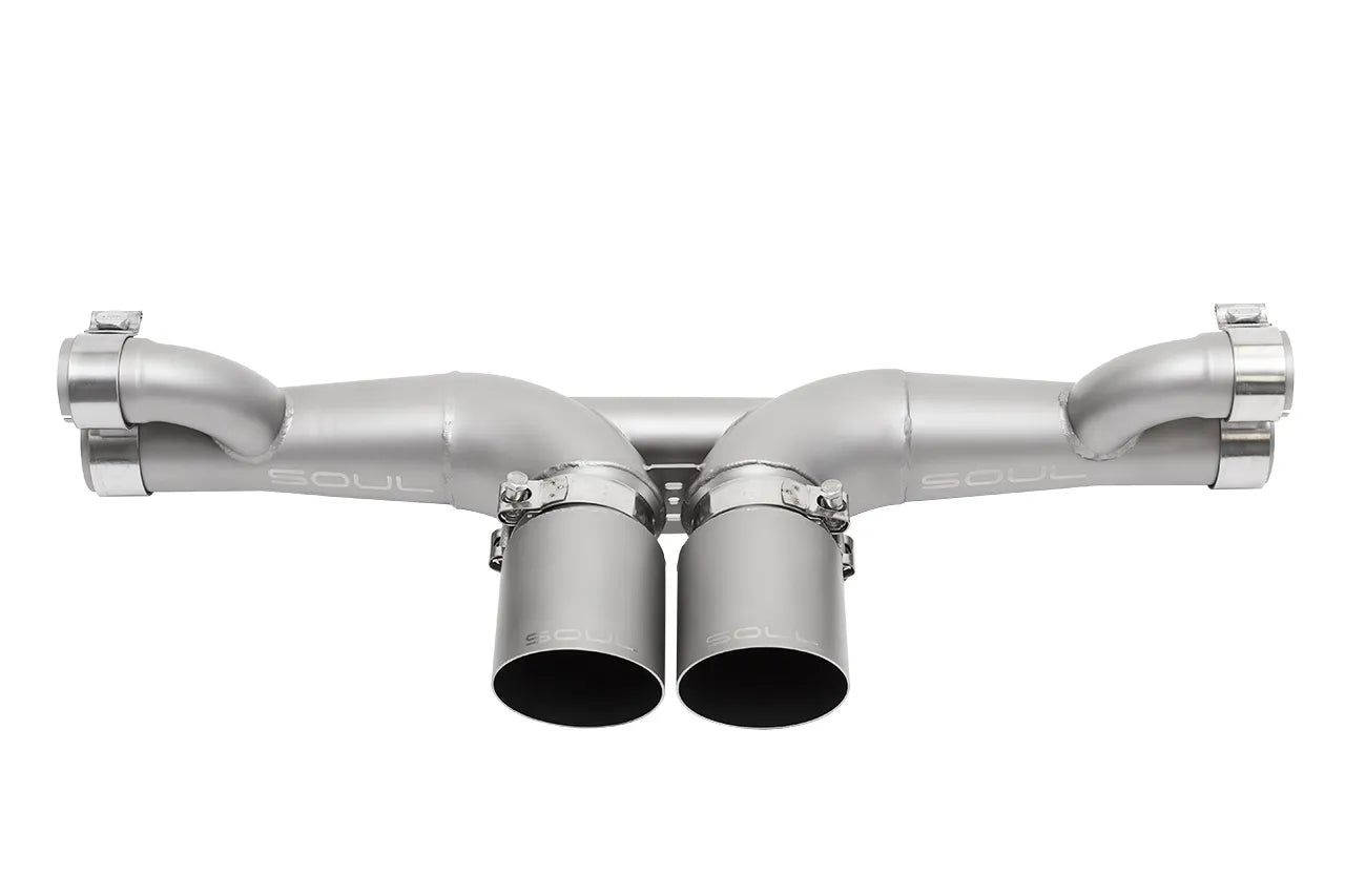 Soul Performance center muffler bypass exhaust system in silver with slash cut single wall exhaust tip for Porsche 911 GT3 on a white background.