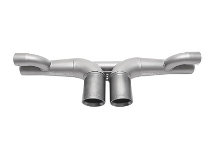Soul Performance center muffler bypass exhaust system in silver for Porsche 911 GT3 on a white background.