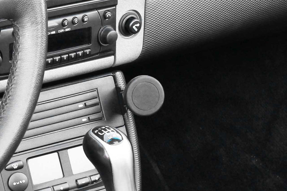 Porsche interior with Rennline magnetic phone mount installed.