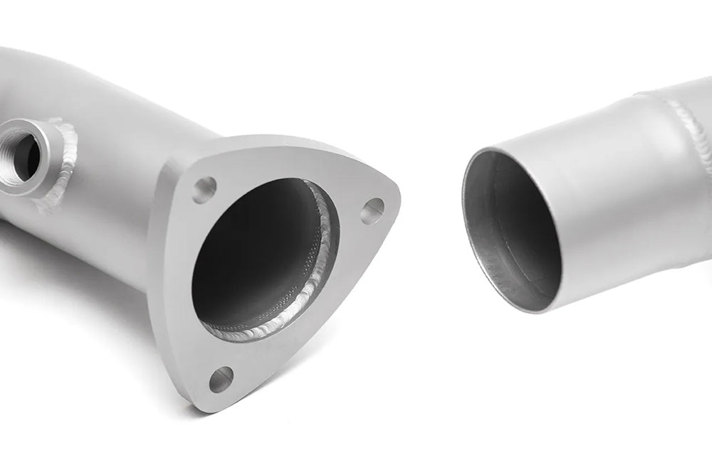 Close up of Soul performance sport catalytic converter bypass pipe exhaust for Porsche on a white background.