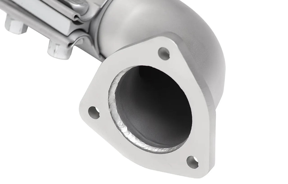 Close-up of a Soul performance center muffler bypass exhaust for Porsche on a white background.