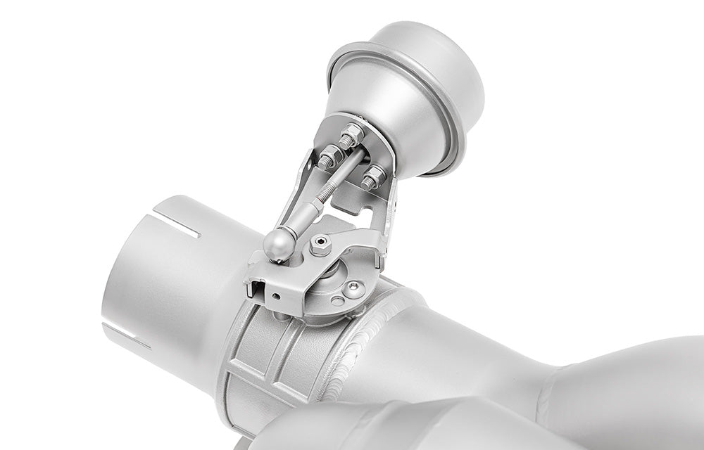 Detail of valve component on Soul Performance valved x-pipe exhaust system for Porsche 991.2 with PSE on a white background.