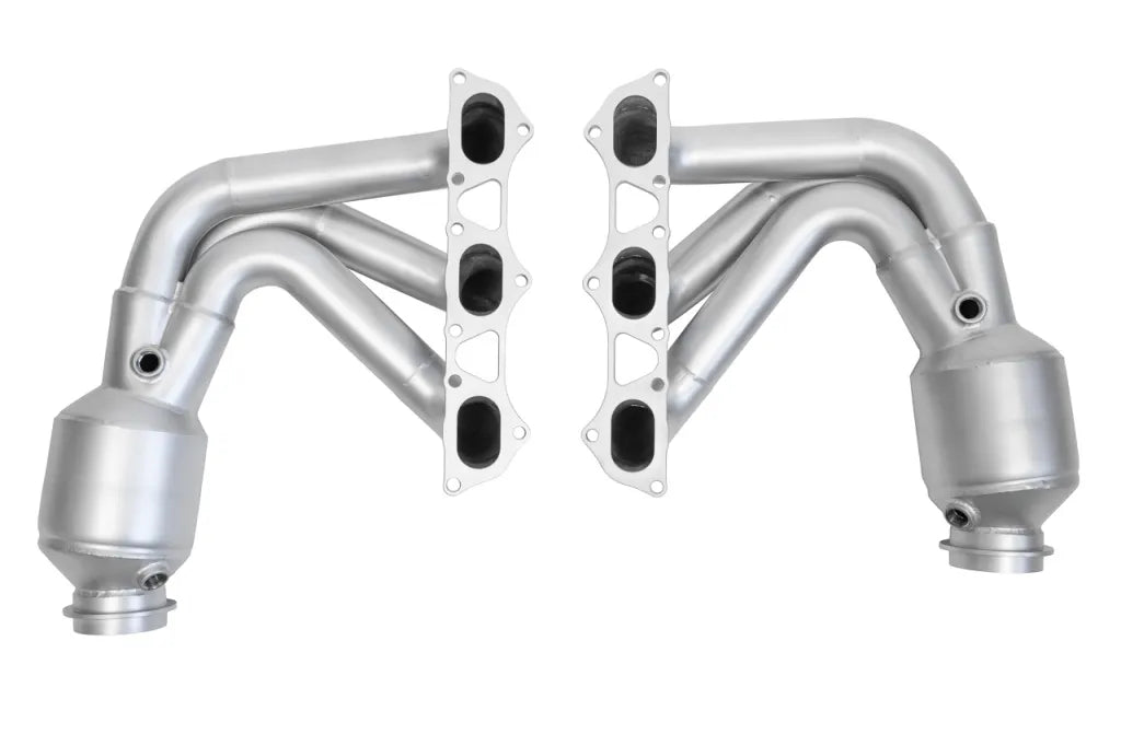 Pair of Soul Performance street headers in silver for Porsche 911 GT3 on a white background.