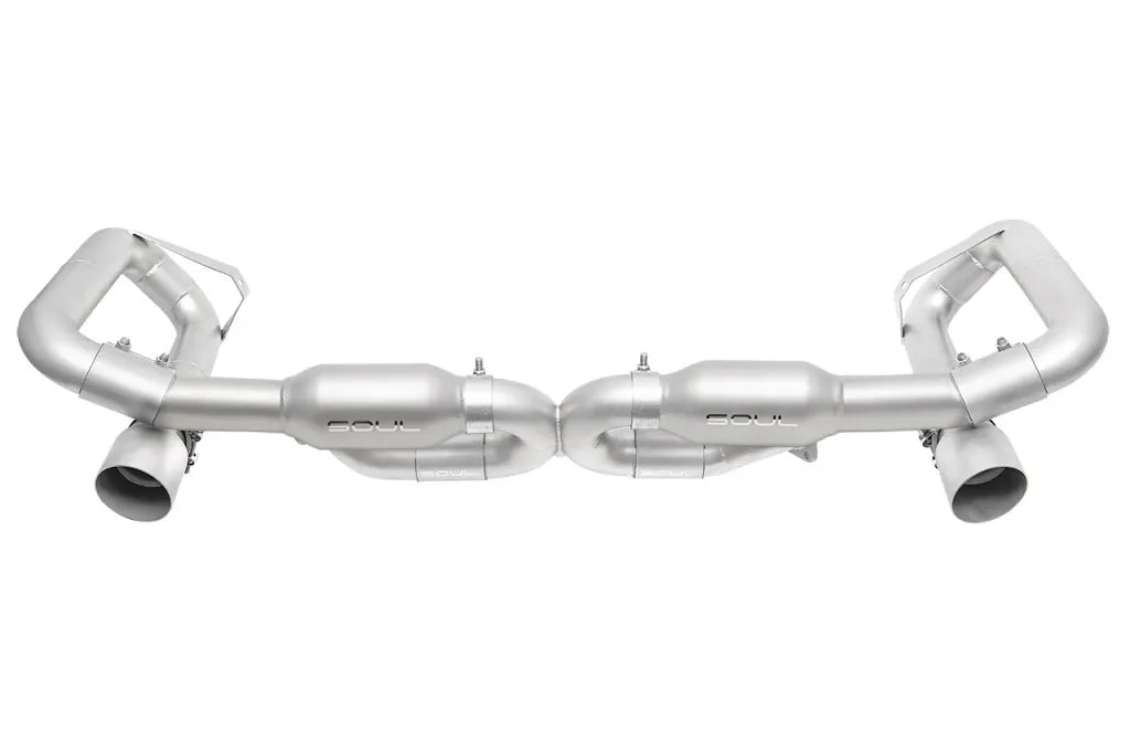 Soul Performance competition muffler bypass with resonators exhaust system in silver for Porsche 993 Carrera on a white background.