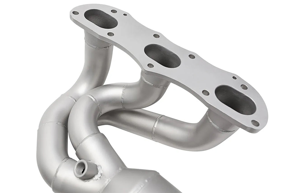 Close up of Soul performance long tube street headers for Porsche on a white background.