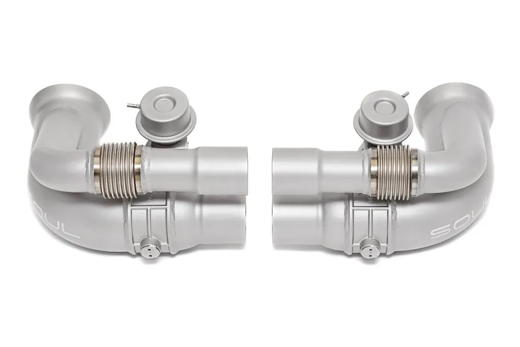 Pair of Soul Performance side muffler valved bypass exhaust pipes in silver for Porsche 911 GT3 on a white background.