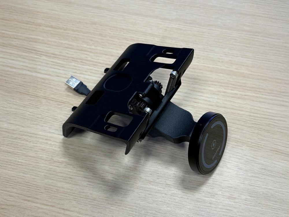 Triebwerk fold-out smartphone holder for Porsche 964 on wooden table