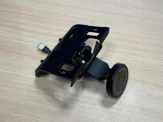 Triebwerk fold-out smartphone holder for Porsche 964 on wooden table