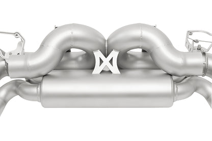 detail of Soul valved exhaust system for porsche 911 992 carrera on white background.