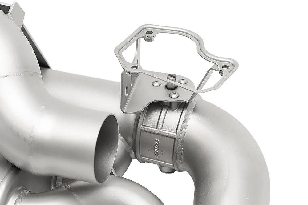 close up of Soul valved exhaust system for porsche 911 992 carrera on white background.