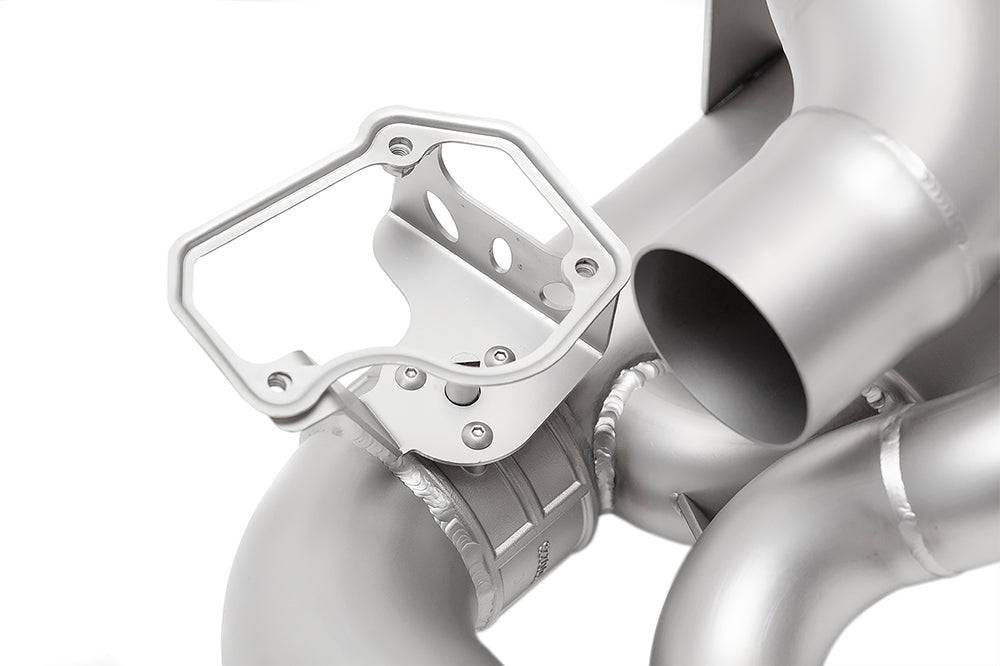 close up of Soul valved exhaust system for porsche 911 992 carrera on white background.