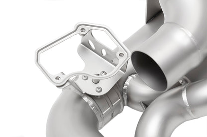 close up of Soul valved exhaust system for porsche 911 992 carrera on white background.