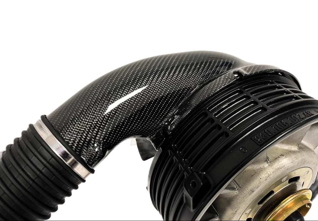 Porsche 964 RS heater duct with carbon fiber pipe on white background.