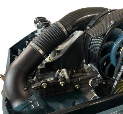 Close-up of a Triebwerk fan heater for Porsche 964 RS heater duct upgrade with carbon fiber.