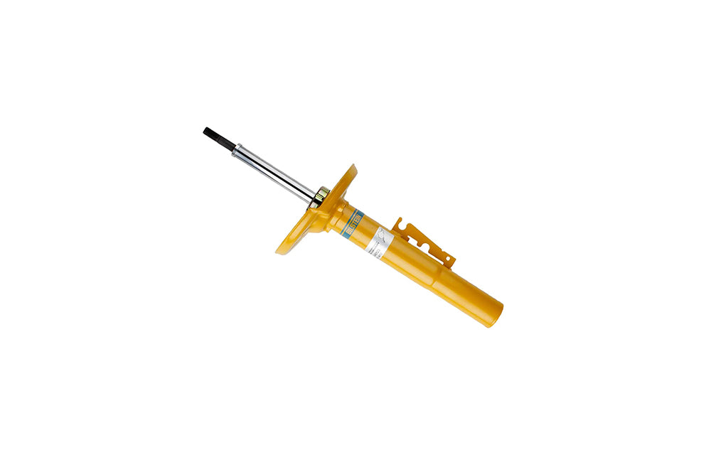 Yellow Bilstein shock absorber for Porsche on white background.