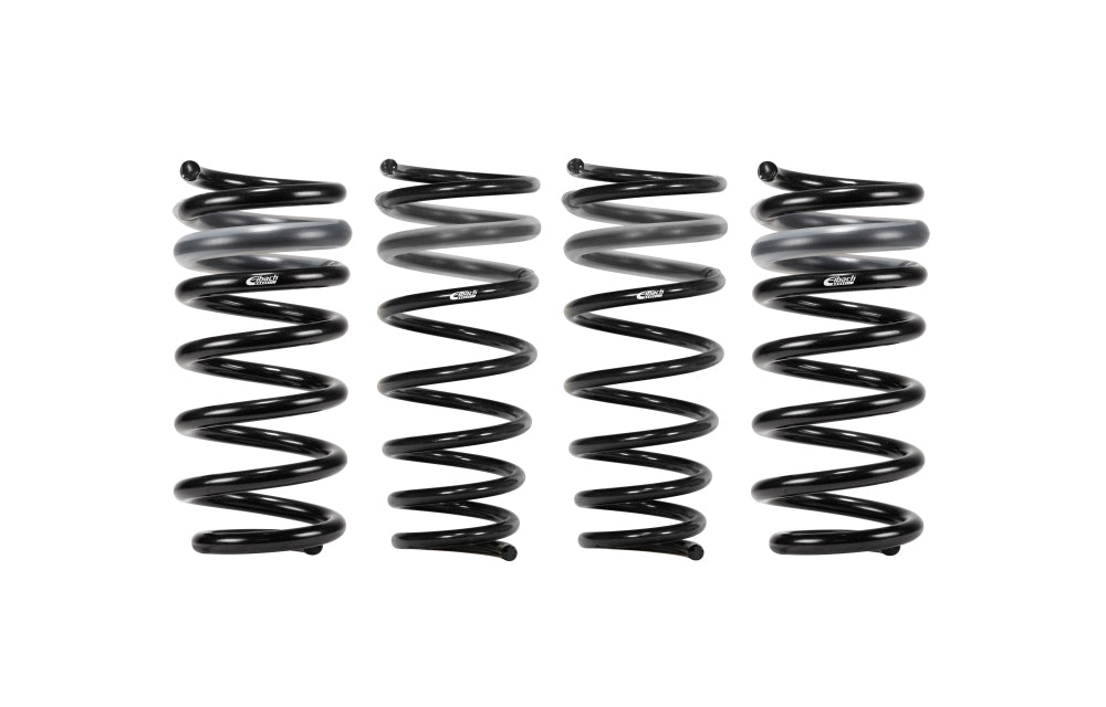 Set of black Eibach pro-kit springs for Porsche 911 992 on white background.