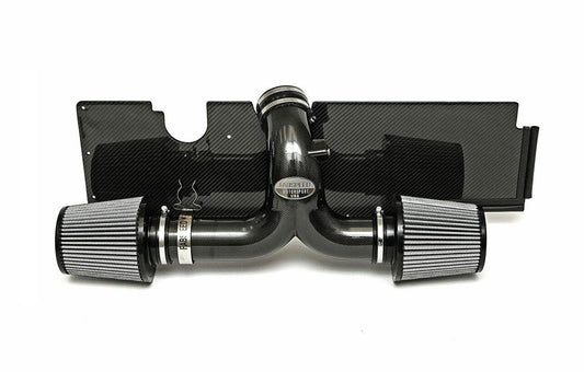 Fabspeed air intake system with carbon fiber heat shield for Porsche on a white background.