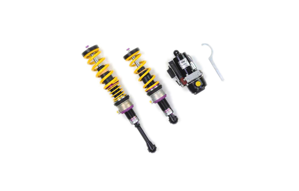 Pair of KW V3 coilovers with hardware on white background.