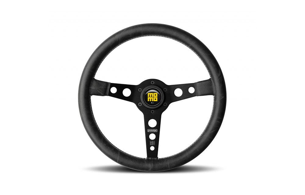 Momo heritage prototipo steering wheel in black in white background.