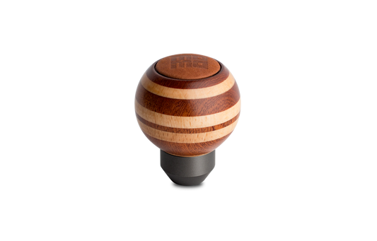 Momo Targa Heritage wooden shift knob with spherical design and leather top insert on transparent background.
