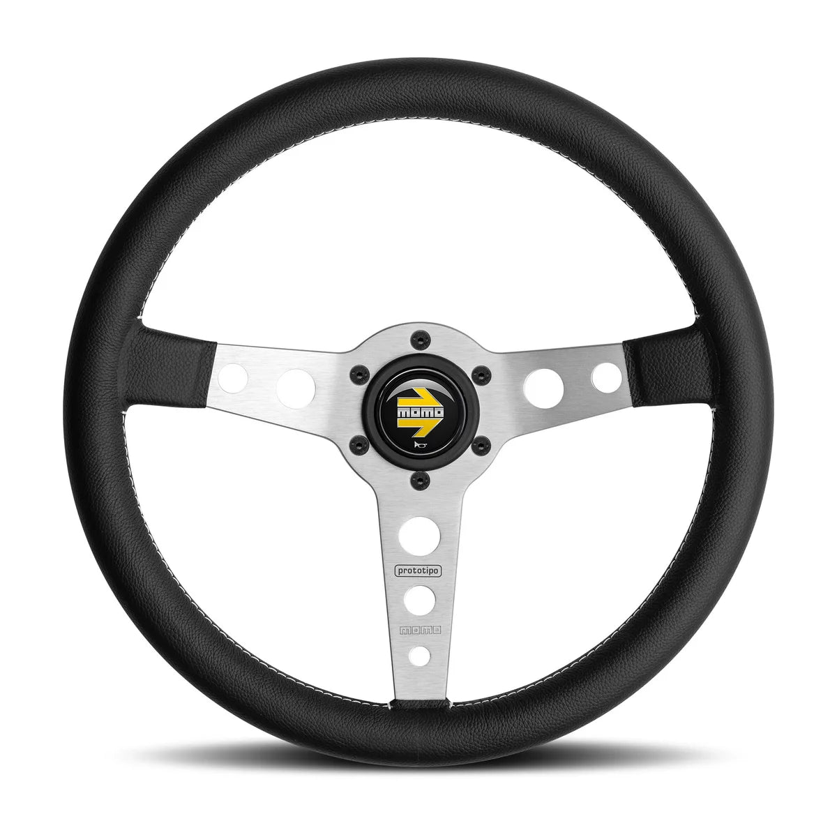 Momo Prototipo leather-wrapped steering wheel with silver spokes and Momo logo on horn button on a white background.