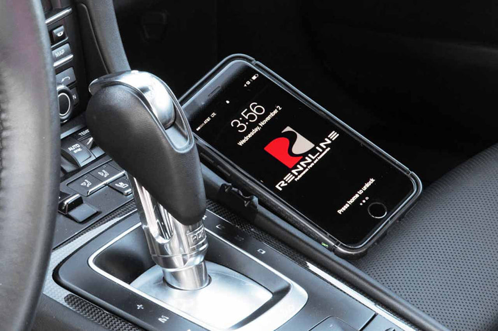Porsche interior with Rennline magnetic phone mount installed.