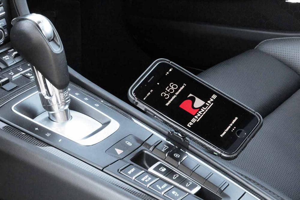 Porsche interior with Rennline magnetic phone mount installed.