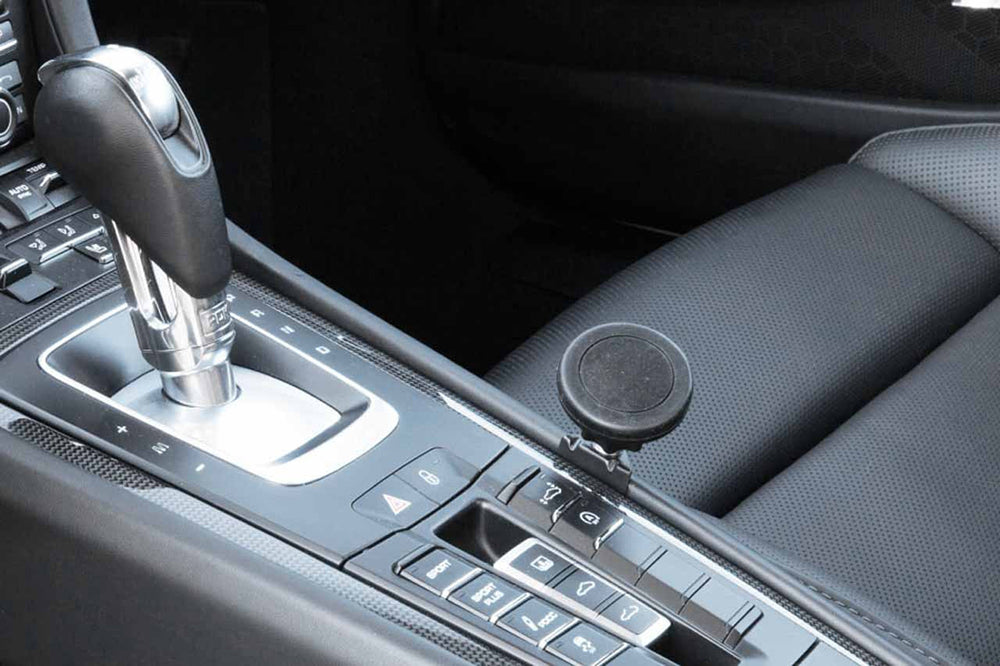 Porsche interior with Rennline magnetic phone mount installed.