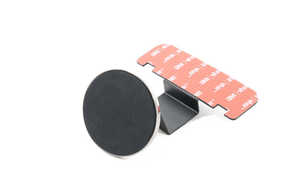 Rennline black magnetic car holder with adhesive strip on a white background.
