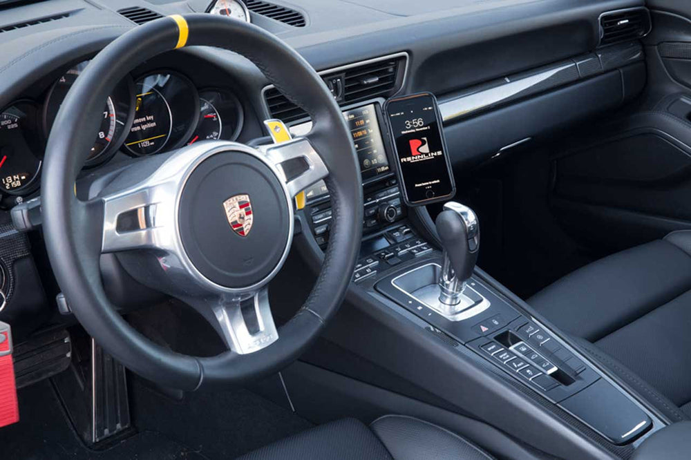 Porsche interior with Rennline magnetic phone mount installed.