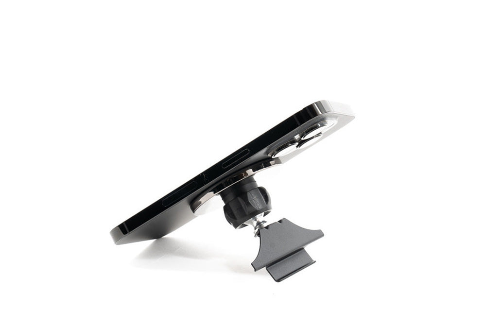 Rennline magnetic phone mount with phone attached for Porsche Macan.