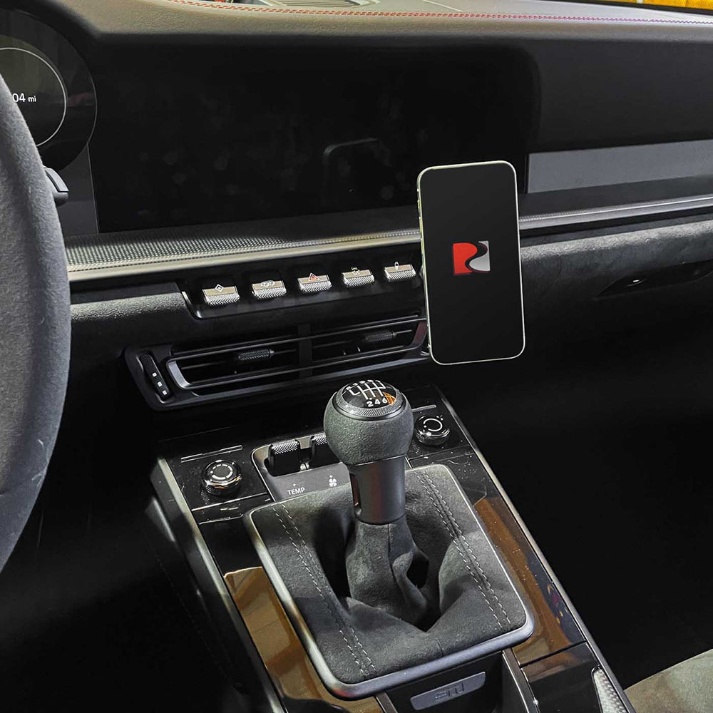 Porsche interior with Rennline magnetic phone mount installed for Porsche 992.