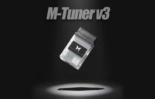 M-Engineering M-Tuner v3 dongle on a dark background